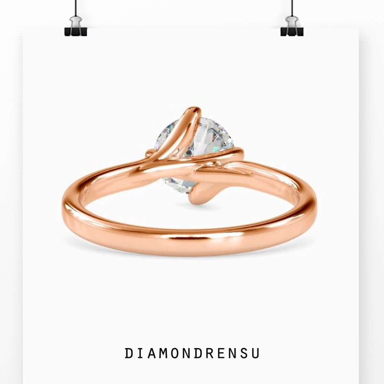 UK engagement ring with lab grown solitaire stone.
