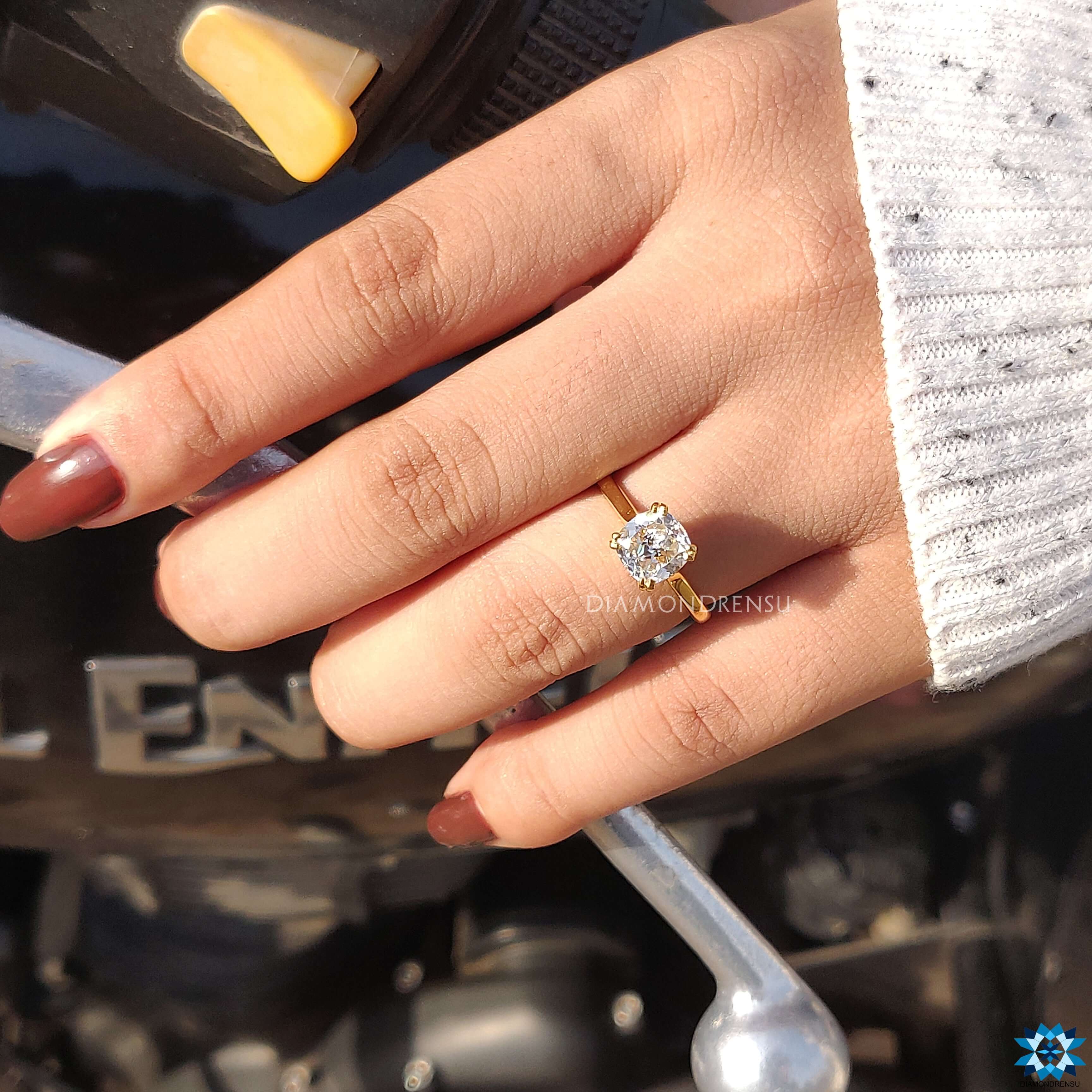 A close-up of a Cushion Solitaire showcasing its unique shape and dazzling shine.
