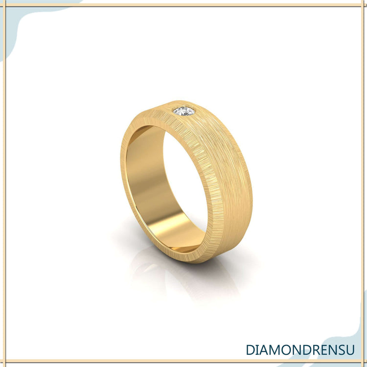 Mens gold wedding band diamond in rose gold with flush setting.
