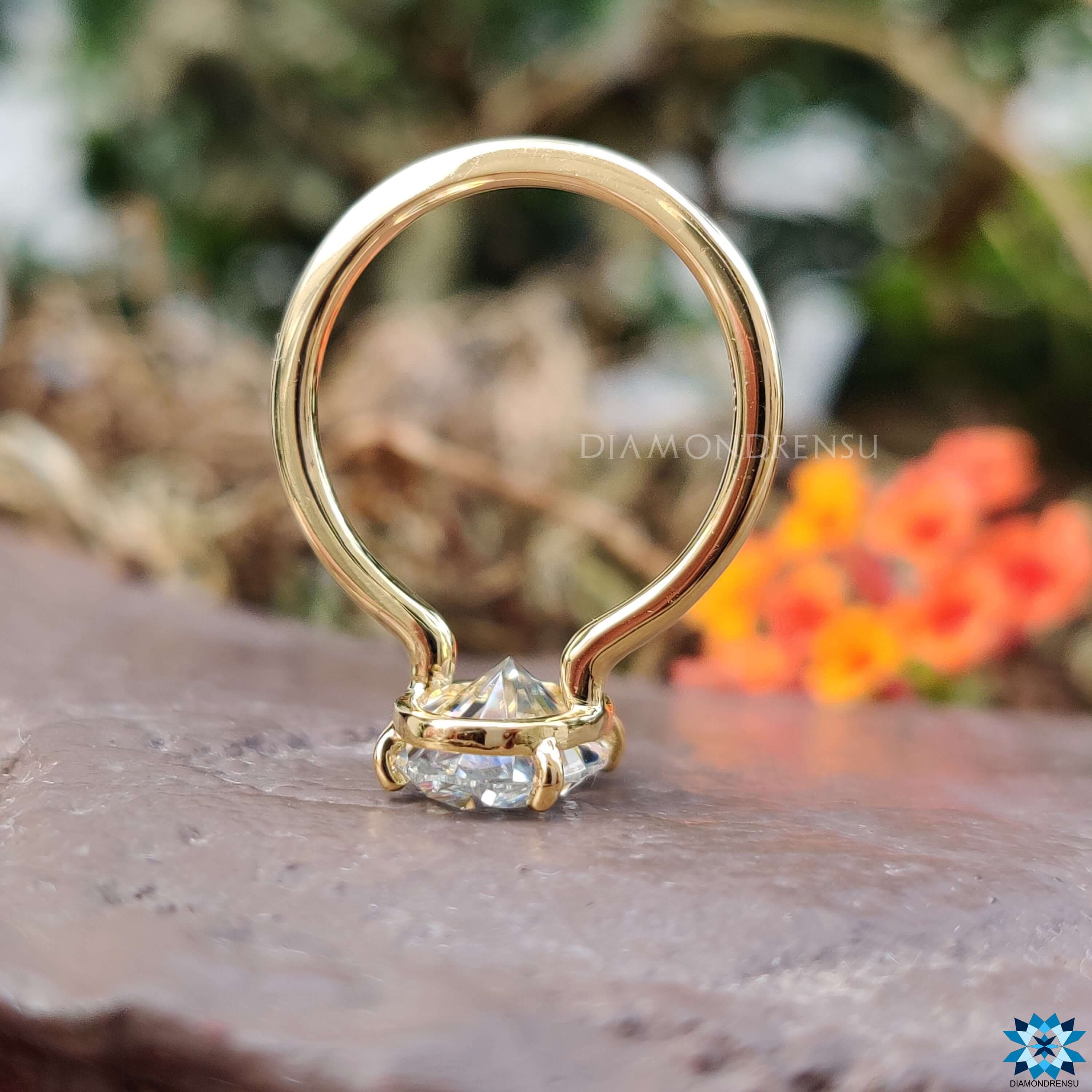 Shop to buy engagement ring featuring a beautiful moissanite solitaire ring.