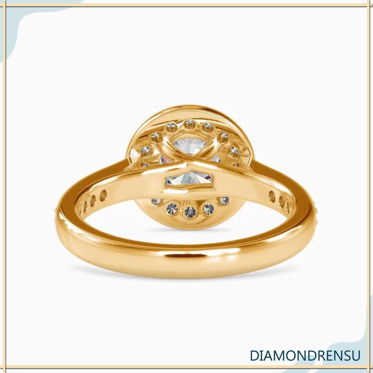 Handmade ring with round cut diamond and pave halo setting.
