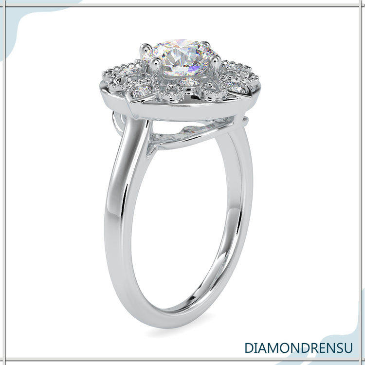 Vintage ring featuring round cut lab grown diamond and filigree design.
