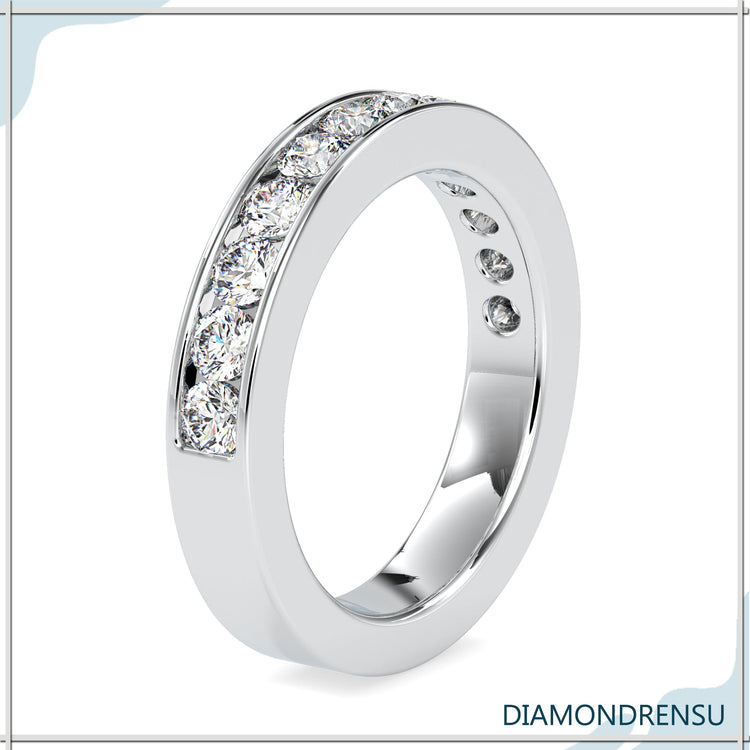 Buy UK wedding band with channel round cut diamonds.
