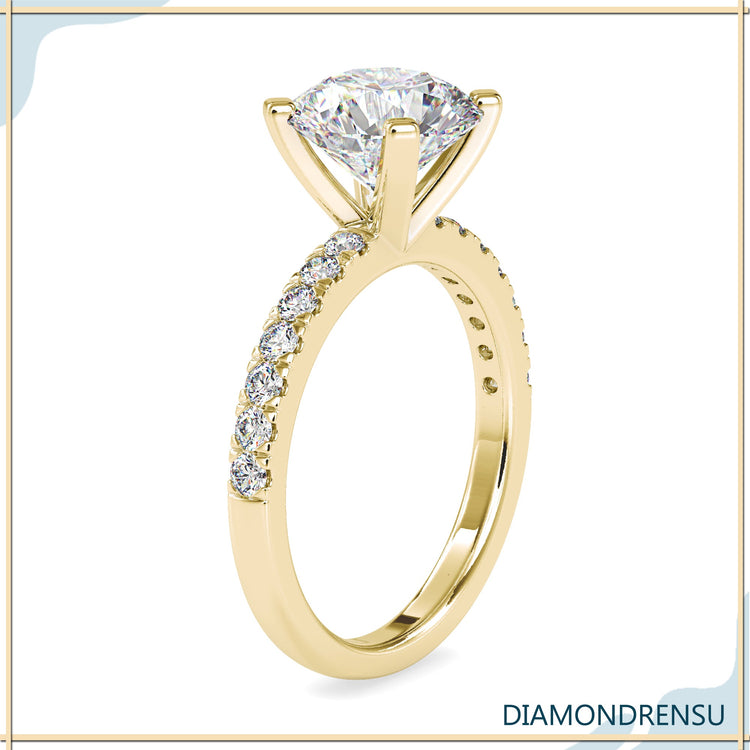 Rose gold diamond ring with round cut centre stone.
