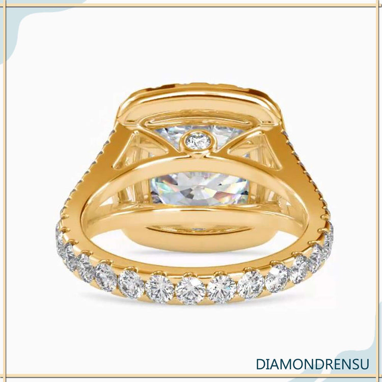 Handmade jewellery with cushion cut and halo detail.
