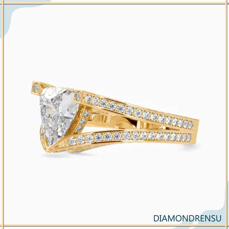 Yellow gold engagement ring with antique cut diamond.

