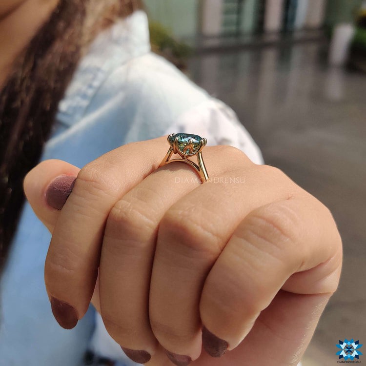 Classic cathedral setting ring with handmade finish.
