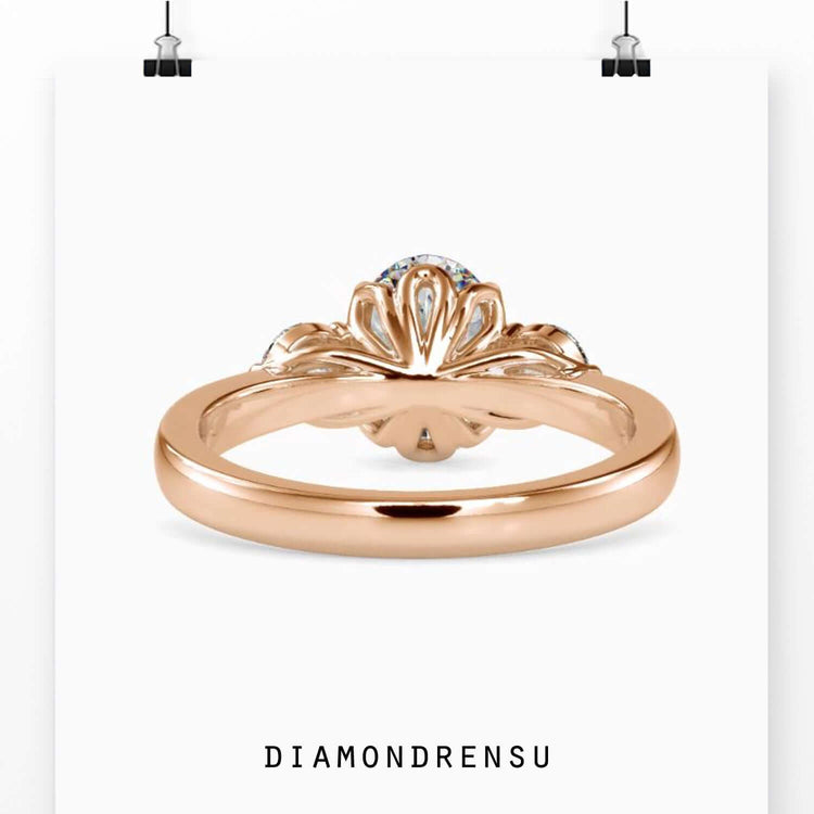 Handmade three stone ring in rose gold.

