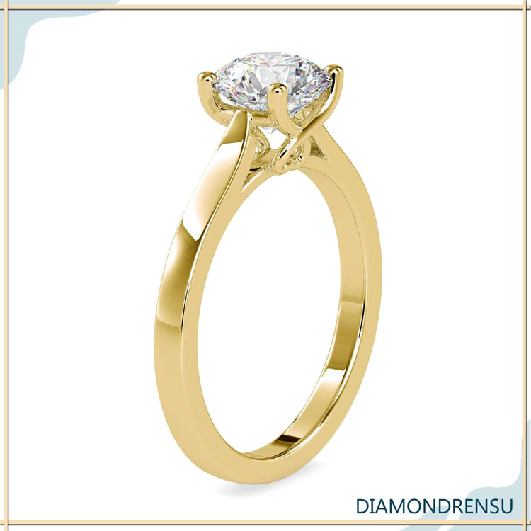 Custom design ring in rose gold with 4 prong setting.
