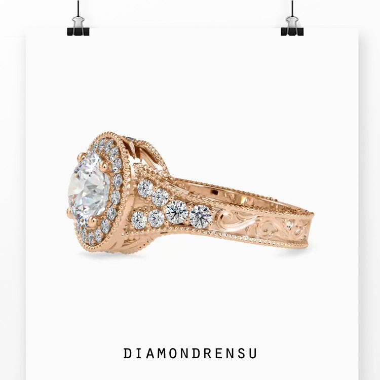 White gold diamond ring with round cut side stones.
