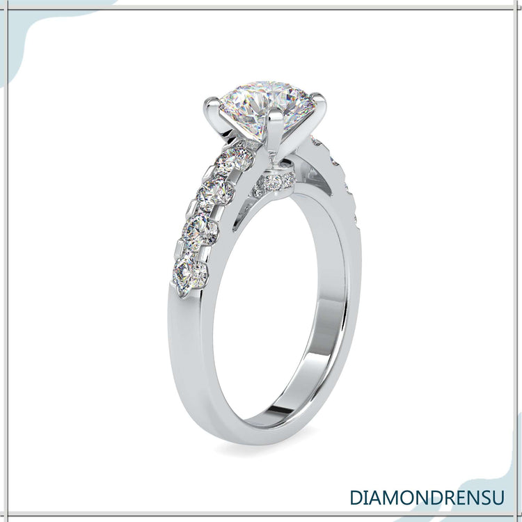 White gold diamond ring with IGI certified hidden halo stone.
