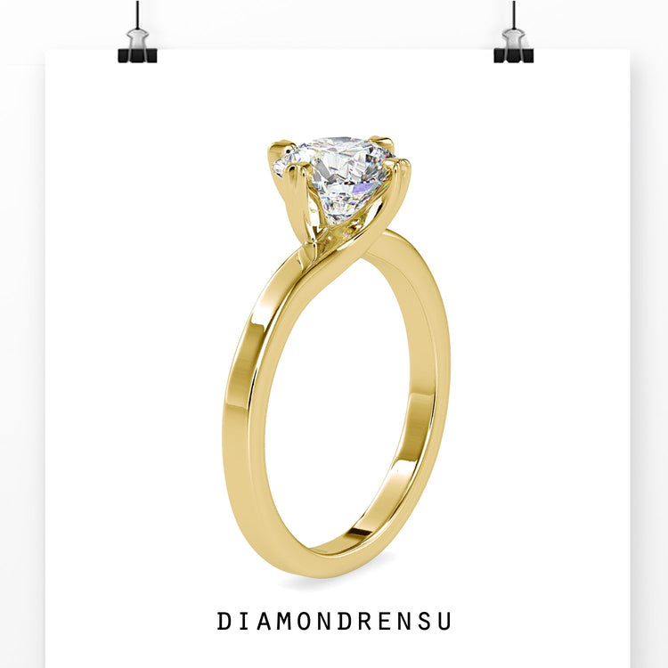 Round diamond solitaire ring in rose gold, custom made.
