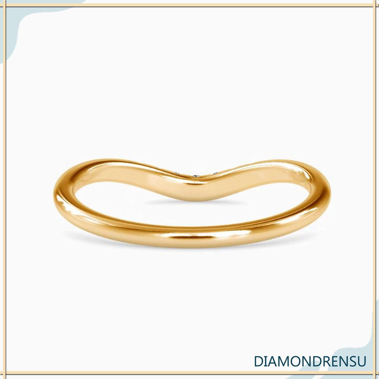 White gold band set with round cut diamonds.
