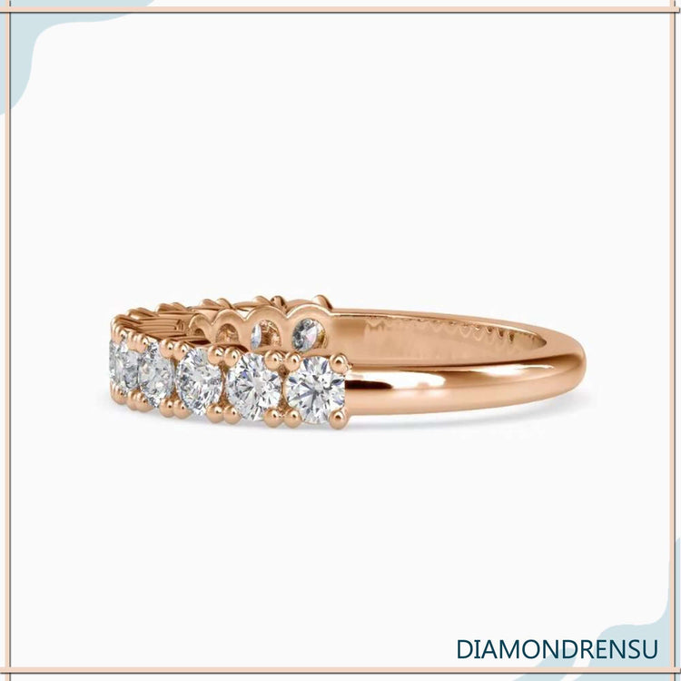 Round diamond band in rose gold for UK weddings.
