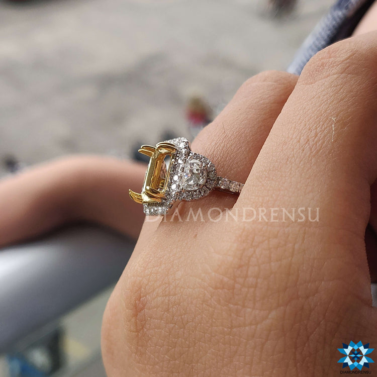 Handmade moissanite ring with halo and side stones.
