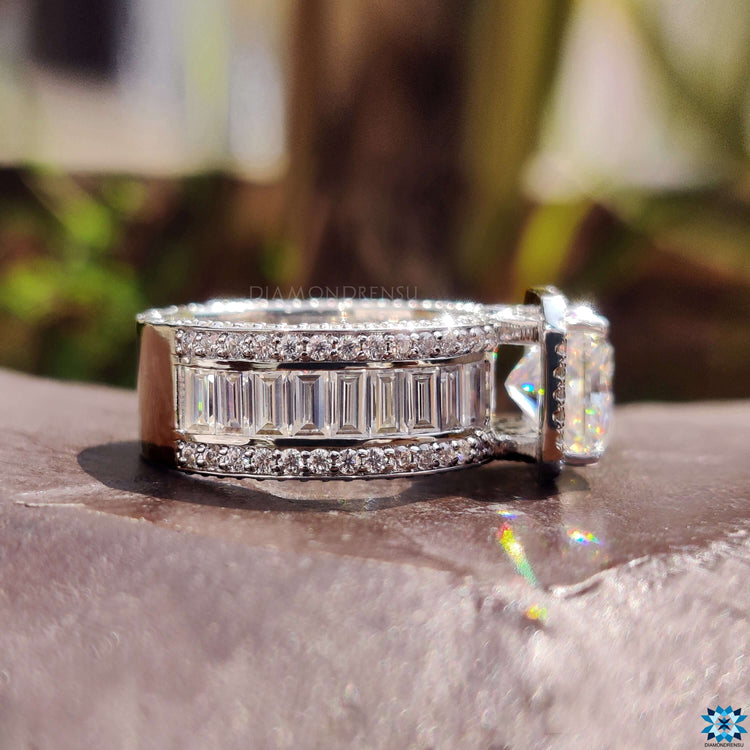 Baguette cut pave band with radiant center stone.
