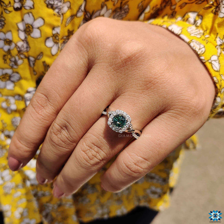 Cyan blue moissanite engagement ring.