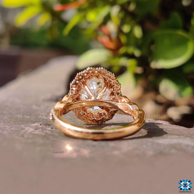 Custom engagement ring featuring halo design.
