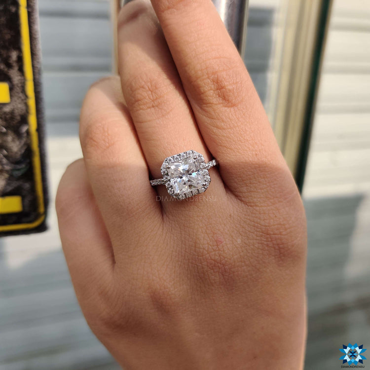 Radiant cut ring with white gold band.
