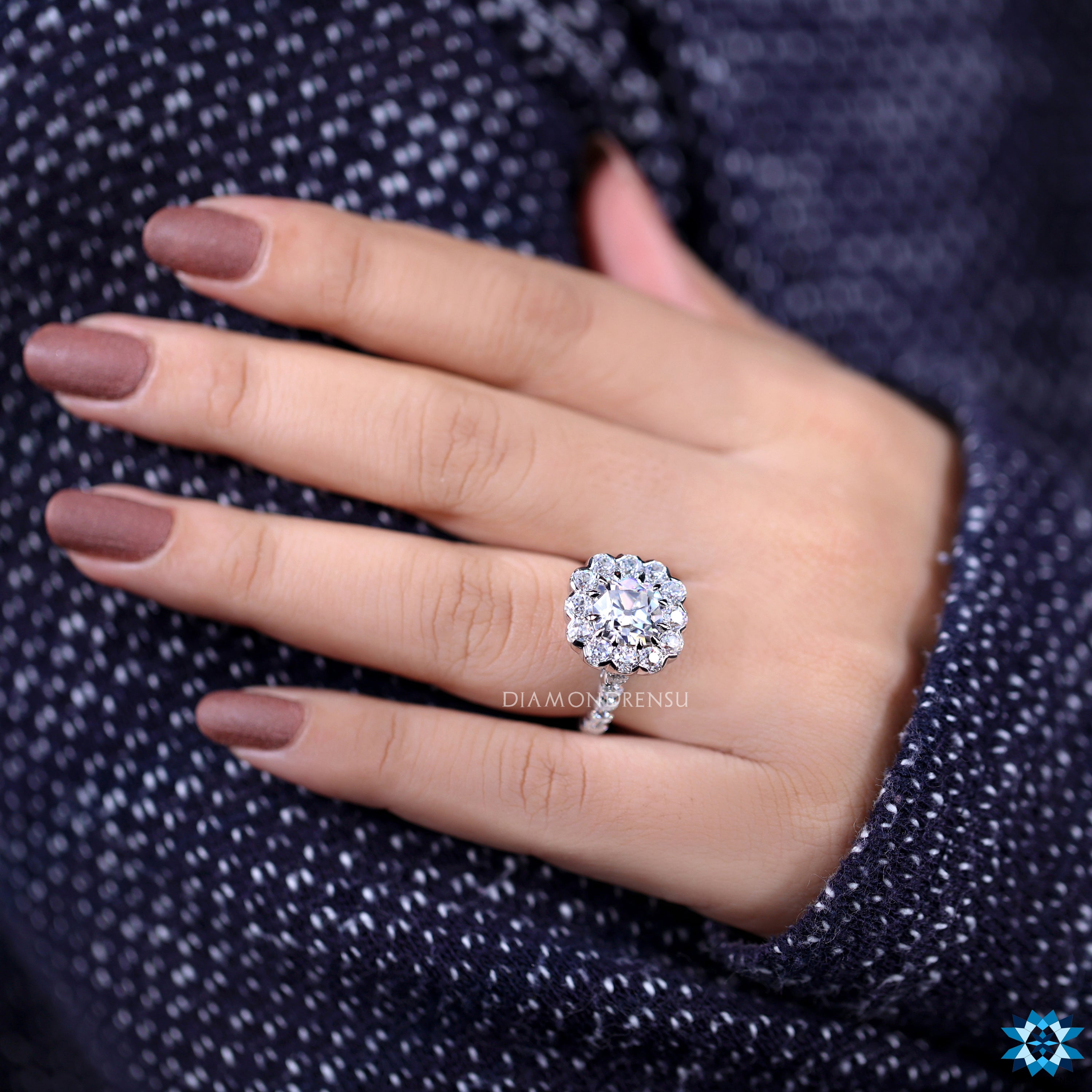 Moissanite pave ring with handmade round cut and cushion setting style.
