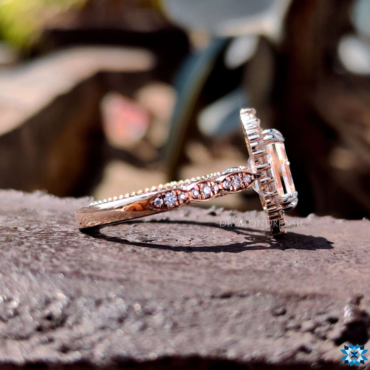 Moissanite halo ring with peekaboo design.
