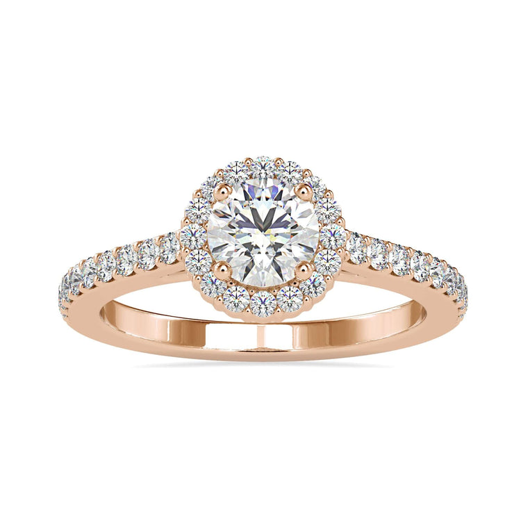 Round brilliant cut diamond ring with a classic pave setting in white gold.
