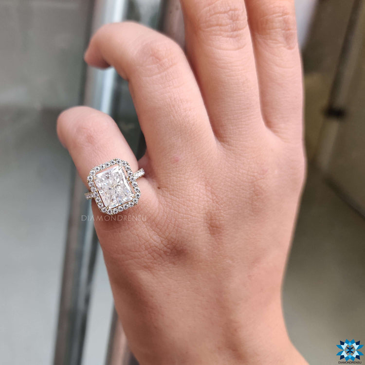 Diamondrensu UK handmade hidden halo radiant moissanite engagement ring.
