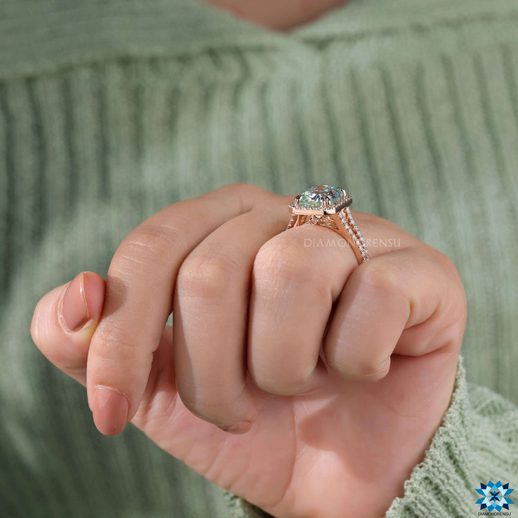 Peekaboo engagement ring with cushion cut halo.
