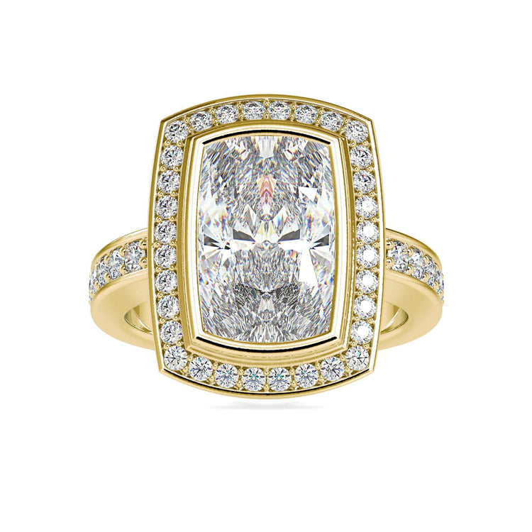 UK engagement ring with cushion cut and round pave band.
