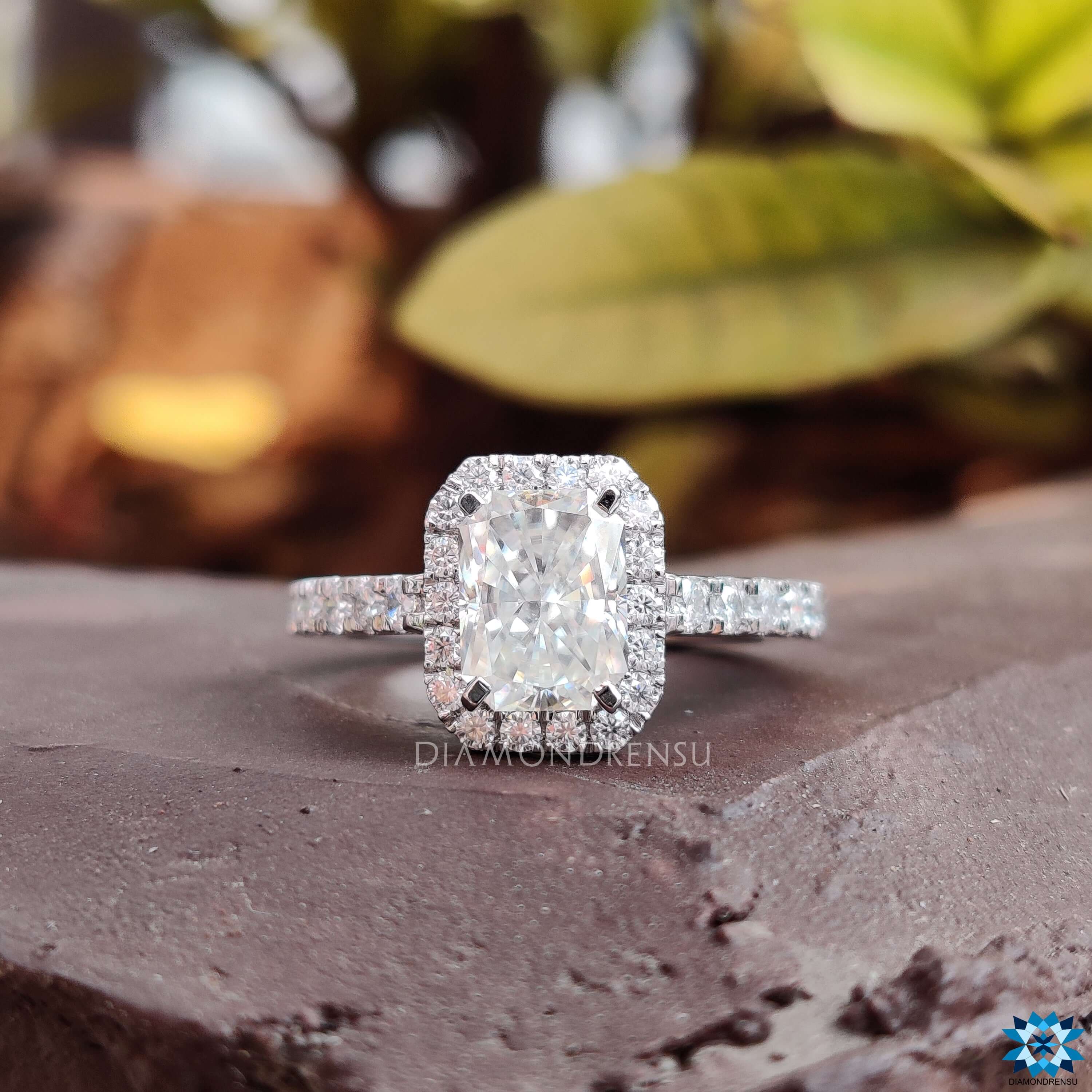 Elegant pave setting ring with a radiant cut centre and sparkling accents.