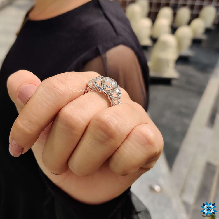Buy moissanite ring with prong setting and five stones.
