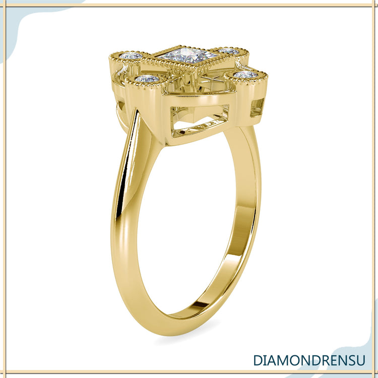 Buy engagement ring with princess centre and round side stones.
