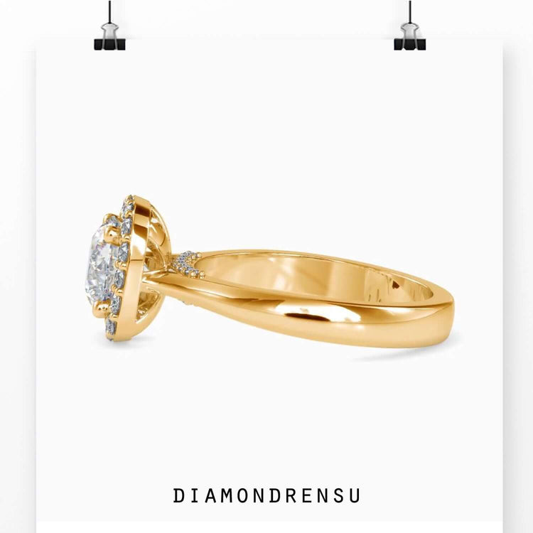 Tapered shank ring featuring handmade round cut diamond.
