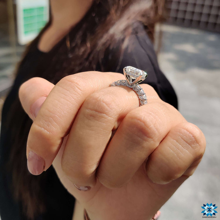 White gold moissanite ring with 4 prong claw setting.
