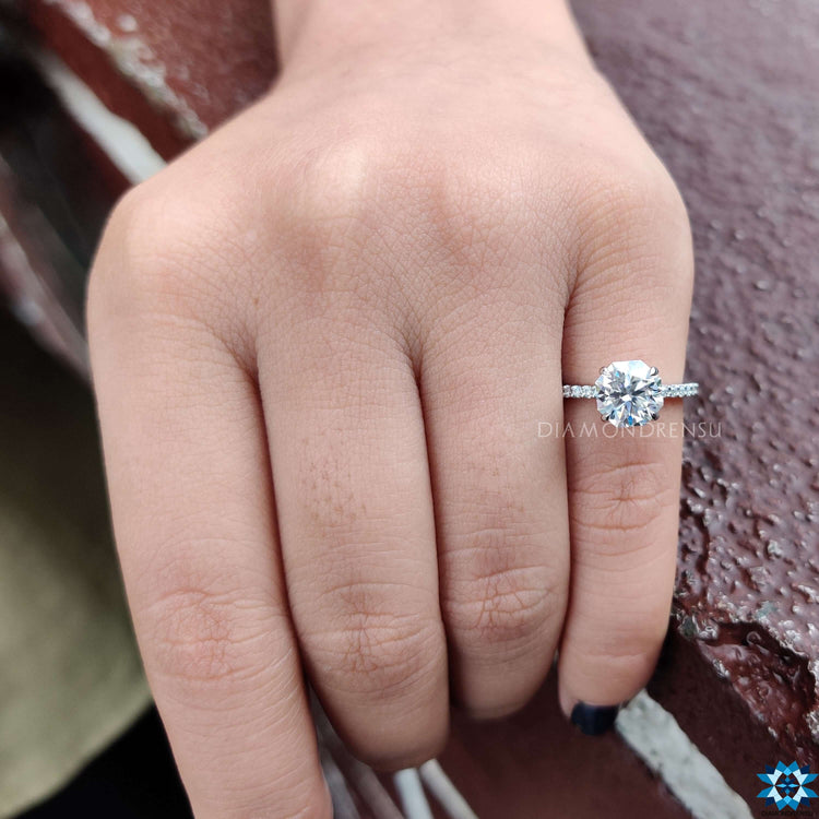 Hidden halo setting with pave and octagon center stone.
