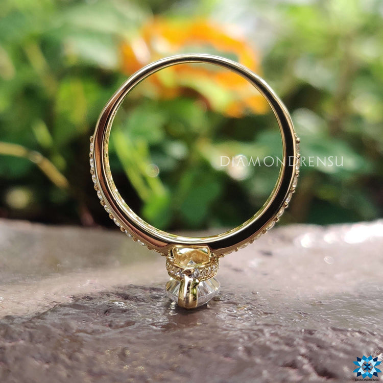 Diamondrensu UK marquise moissanite ring with pave accents.
