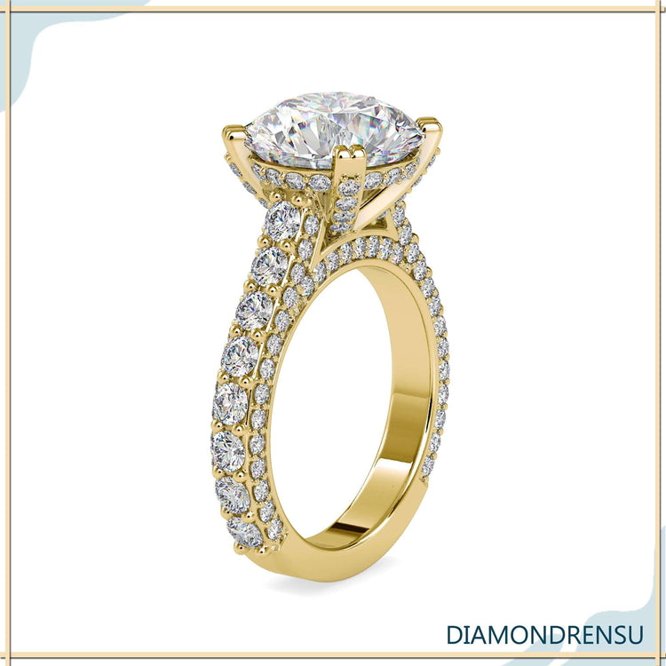 White gold ring with round cut diamond and hidden halo.
