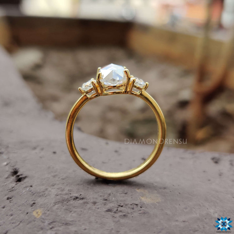 Custom engagement ring with rose cut and European side stones.
