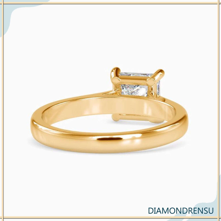 Custom engagement ring in white gold with princess lab diamond.
