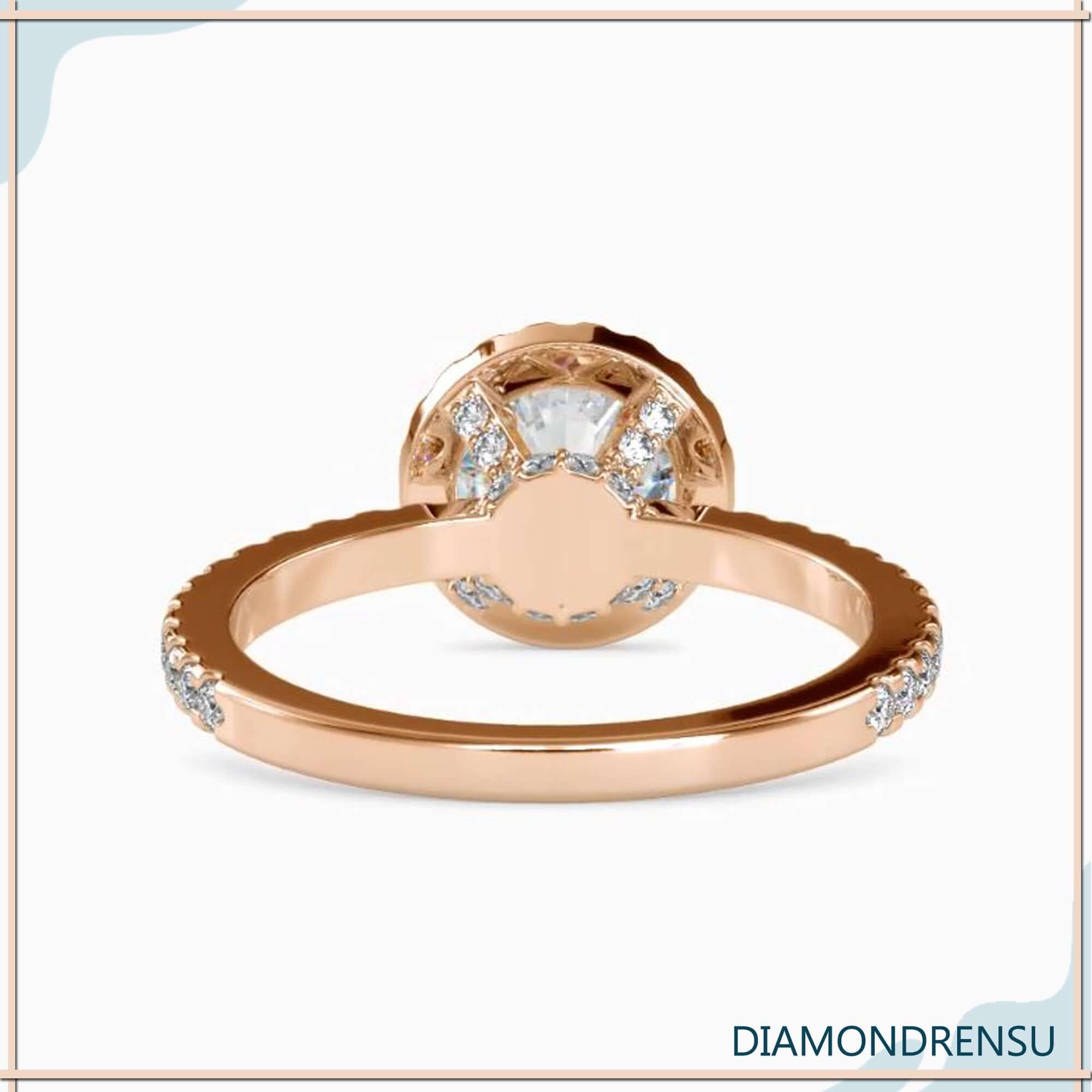 Handmade diamondrensu engagement ring with side stones.