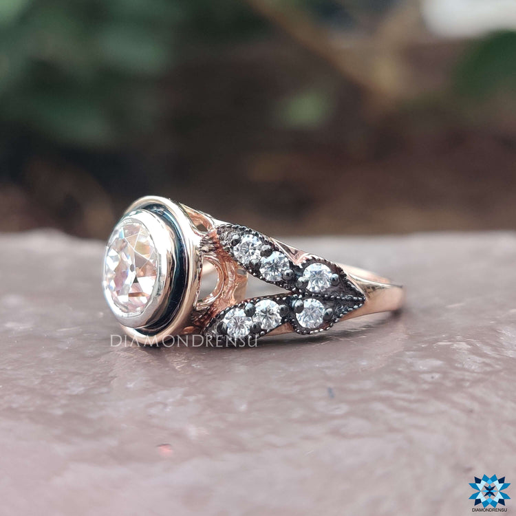 Diamondrensu UK round old mine cut engagement ring.
