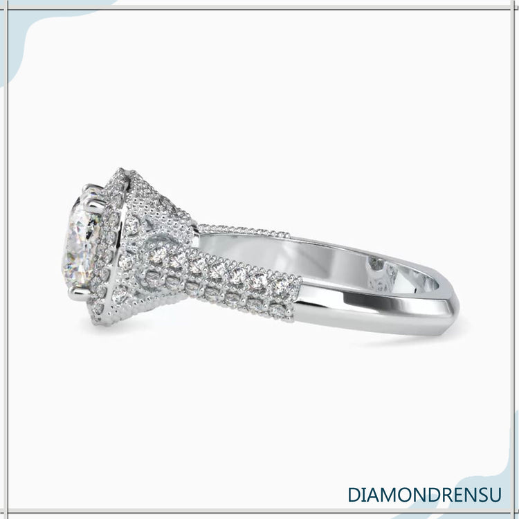 Simple diamond ring with knife edge and 4 prong setting.
