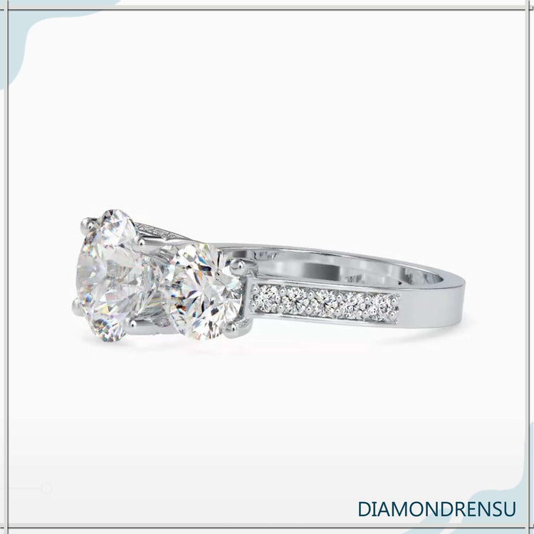 Rose gold engagement ring with round cut pave band.
