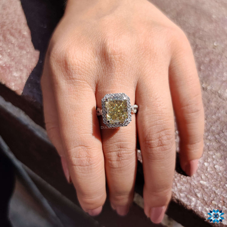 Prong set radiant cut moissanite ring in white gold.
