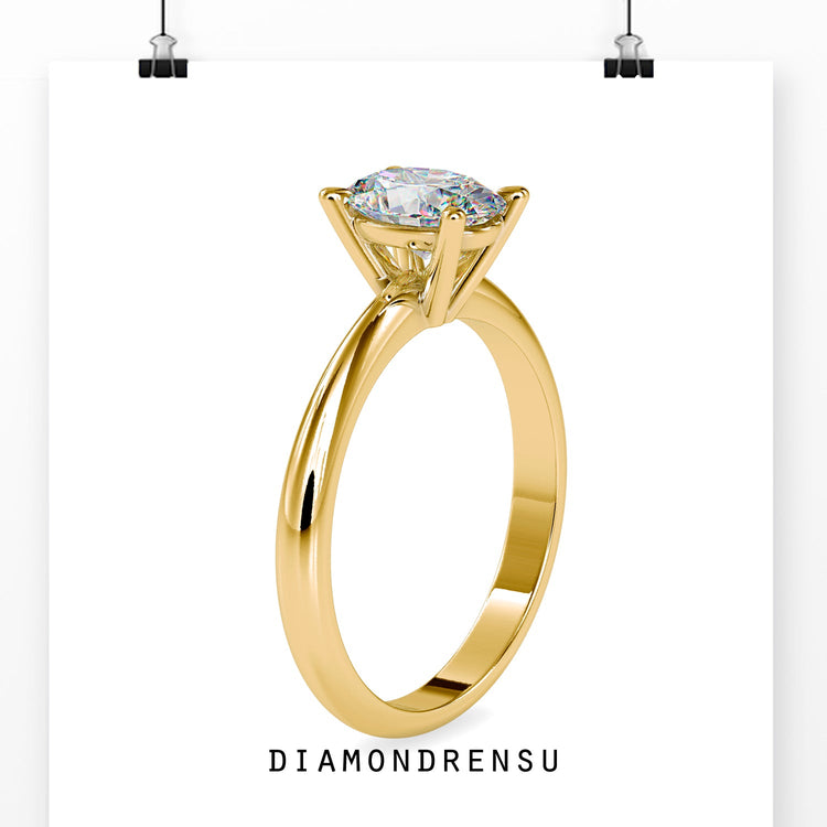 White gold oval centre stone engagement ring UK.
