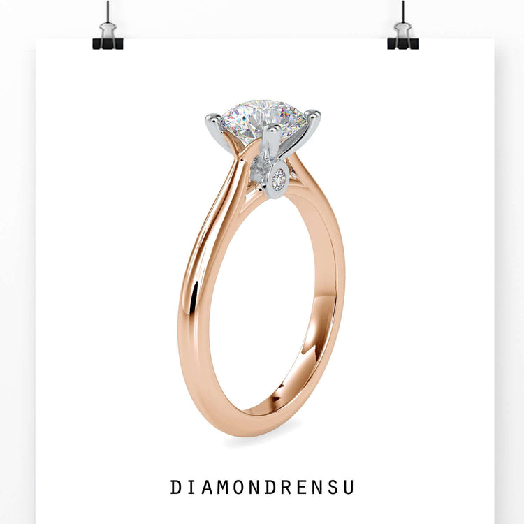 Rose gold diamond ring featuring classic solitaire design.
