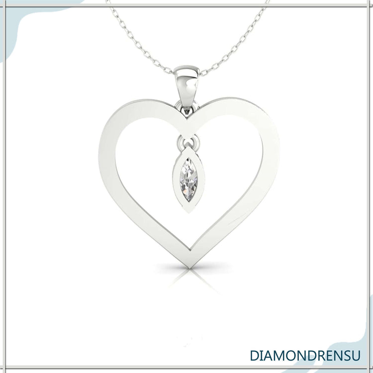 White gold pendant with heart frame and lab grown diamond.

