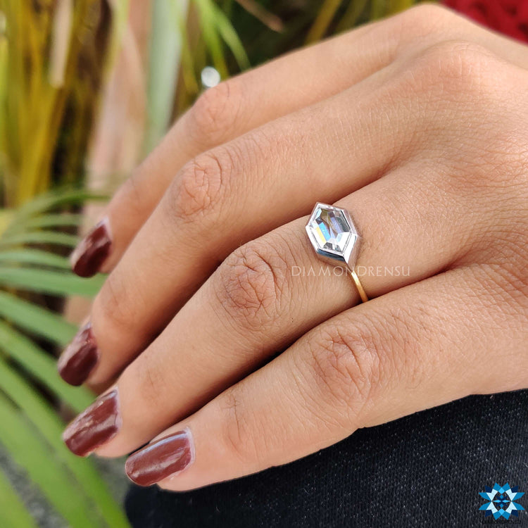 White and yellow gold ring with hexagon rose cut stone.
