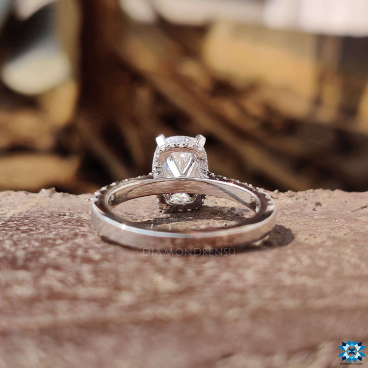 White gold moissanite ring with 4 prong claw setting.
