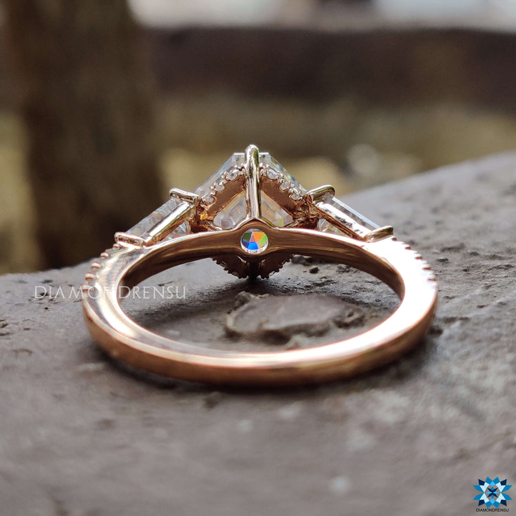 Handmade three stone ring with 4 prong setting.
